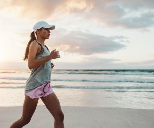 WhiteSands woman running on beach during addiction treatment